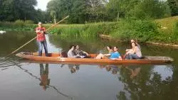 Photograph of students punting on the river in Oxford